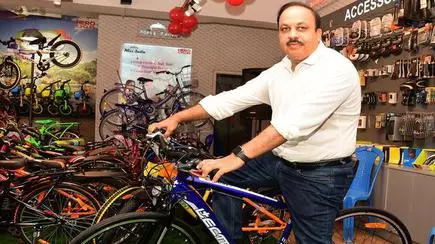 Image result for Hero launched its first electronic cycle and Pankaj Munjal, Chairman of Hero Cycle