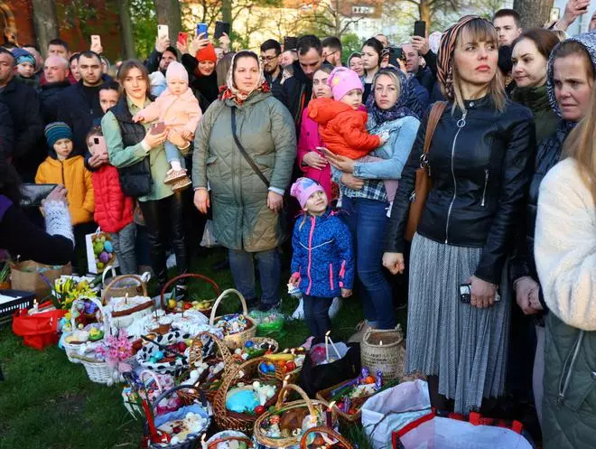 Faithful attend a blessing of traditional Easter food baskets during the church service of the Ukrainian orthodox church community, amid Russia’s invasion of Ukraine, in Berlin, Germany April 24, 2022. 