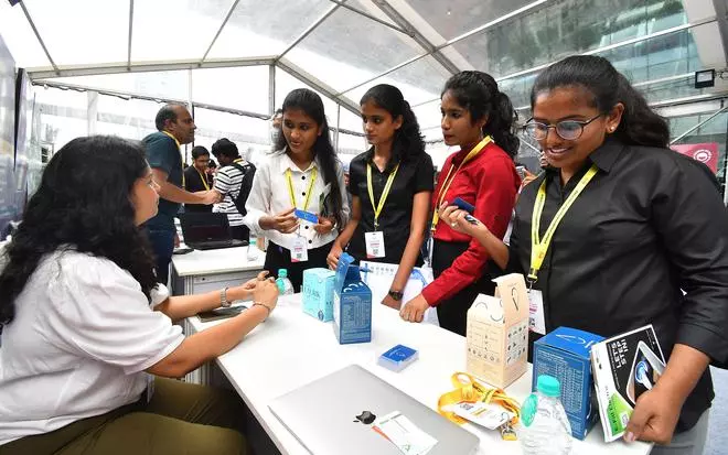 Youngsters enquiring about new startups at T-Hub 2.0 in Raidurg, Hyderabad.