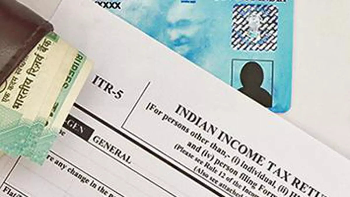 New Indian ITR-5 Income tax Form with Indian currency and PAN or Permanent Account Number on isolated background.